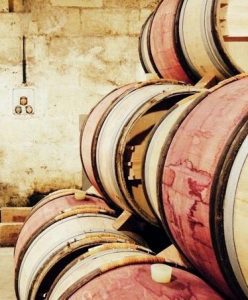Visit of Chais with barrels during a wine day tour from Paris