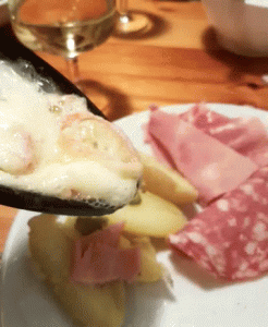 raclette cheese - winter meal and wine